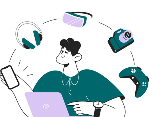Person surrounded by tech gadgets like VR headphones and a game controller